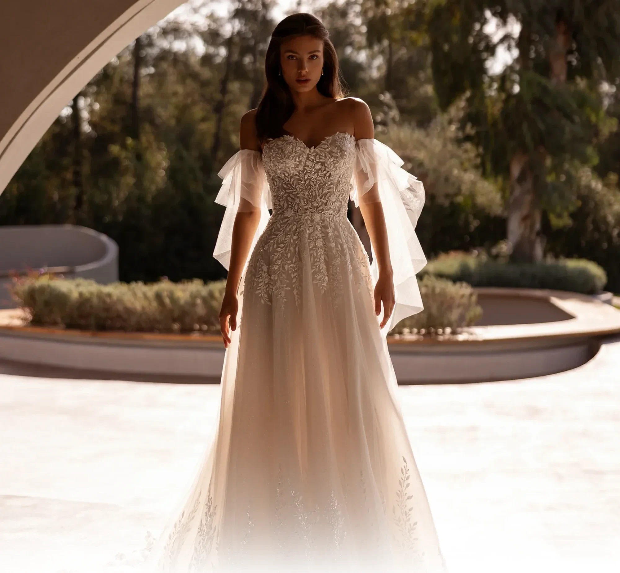 Model wearing a Demetrios gown.